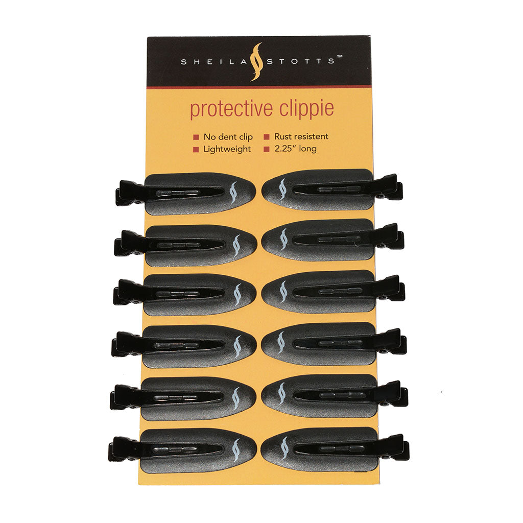 12 protective clippies shown in packaging reading: no dent clip, rust resistant, lightweight and 2.25 inches long. With full logo shown on top of packaging reading Sheila Stotts